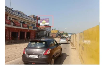 Festive cartoon hoarding near CHAWLA shop, ACME Advertising Co., a leading hoarding advertising company in Jammu and Kashmir.