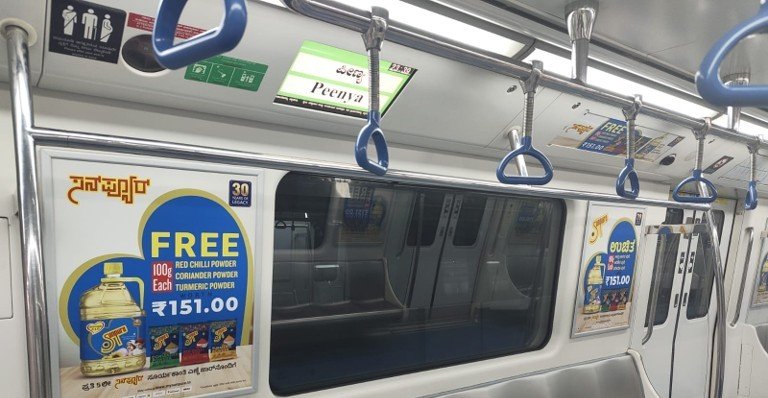 Inside metro train advertising in Jalahalli, Bengaluru - 